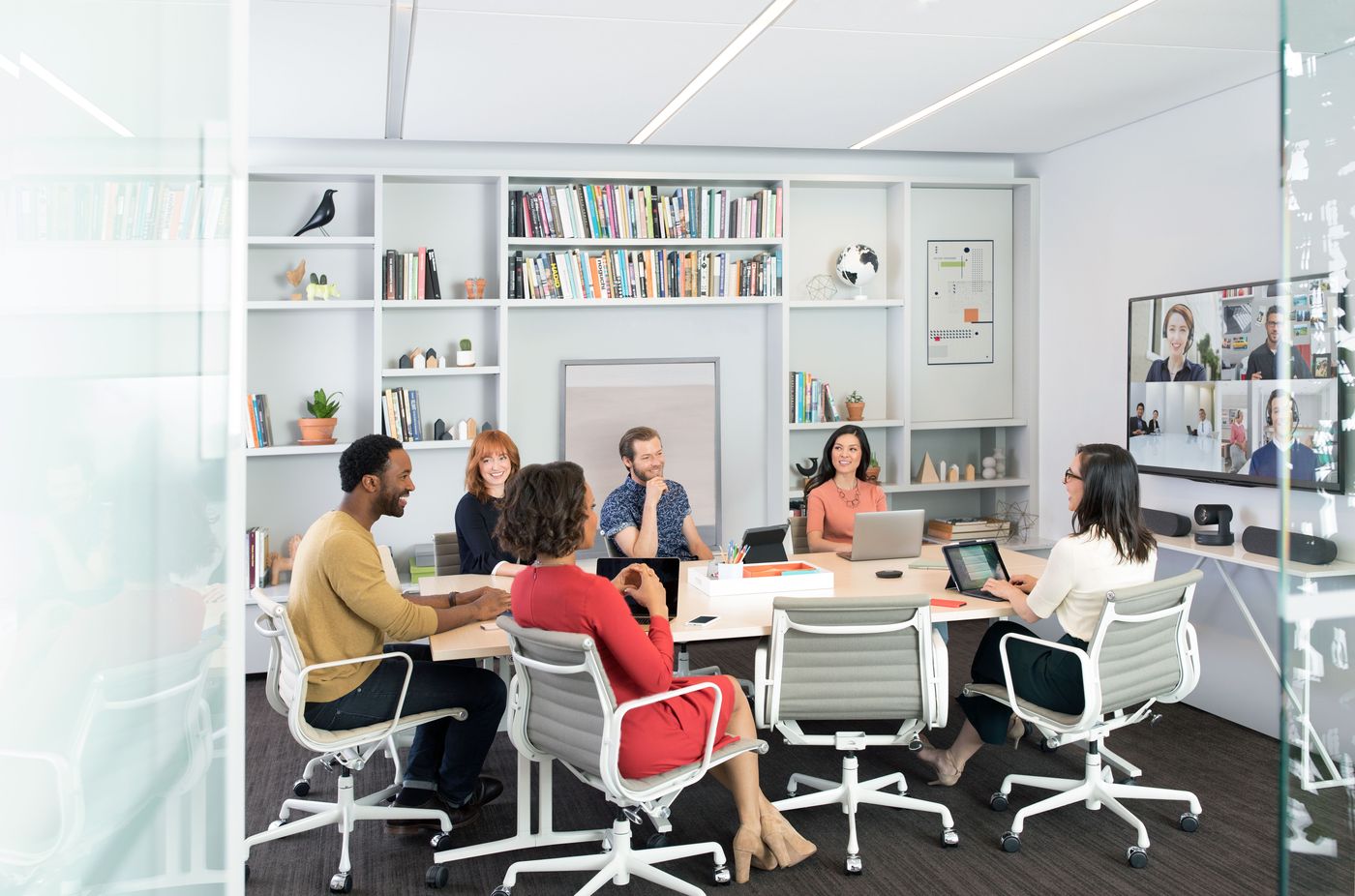 A hybrid team meeting over a Logitech Rally video system